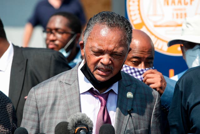 <p>Rev. Jesse Jackson (C), officials from the Kenosha, Wisconsin NAACP, the Urban League and the League of United Latin American Citizens hold a press conference in Kenosha, Wisconsin, on August 27, 2020, to address the police shooting of Jacob Blake, Jr., on August 23.</p>