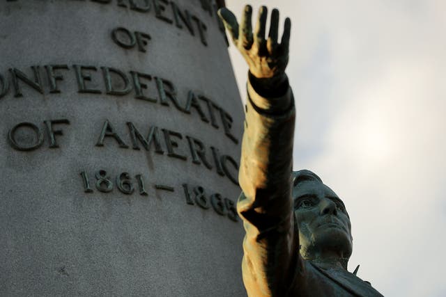 <p> A statue of Confederate President Jefferson Davis, unveild in 1907, stands in the middle of Monument Avenue 23 August, 2017</p>