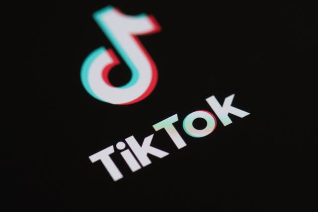 <p>This illustration picture taken on 27 May 2020 in Paris shows the logo of the social network  application Tik Tok on the screen of a phone</p>