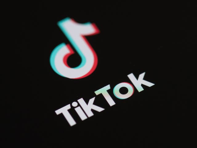 <p>This illustration picture taken on 27 May 2020 in Paris shows the logo of the social network  application Tik Tok on the screen of a phone</p>