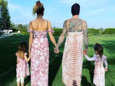 Adam Levine wears a dress to match his wife and daughters in Instagram post