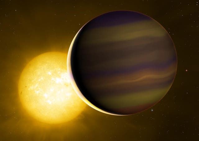 Exoplanet HD 209458b transits its star. The illuminated crescent and its colours have been exaggerated to illustrate the light spectra that the astronomers used to identify the six molecules in its atmosphere