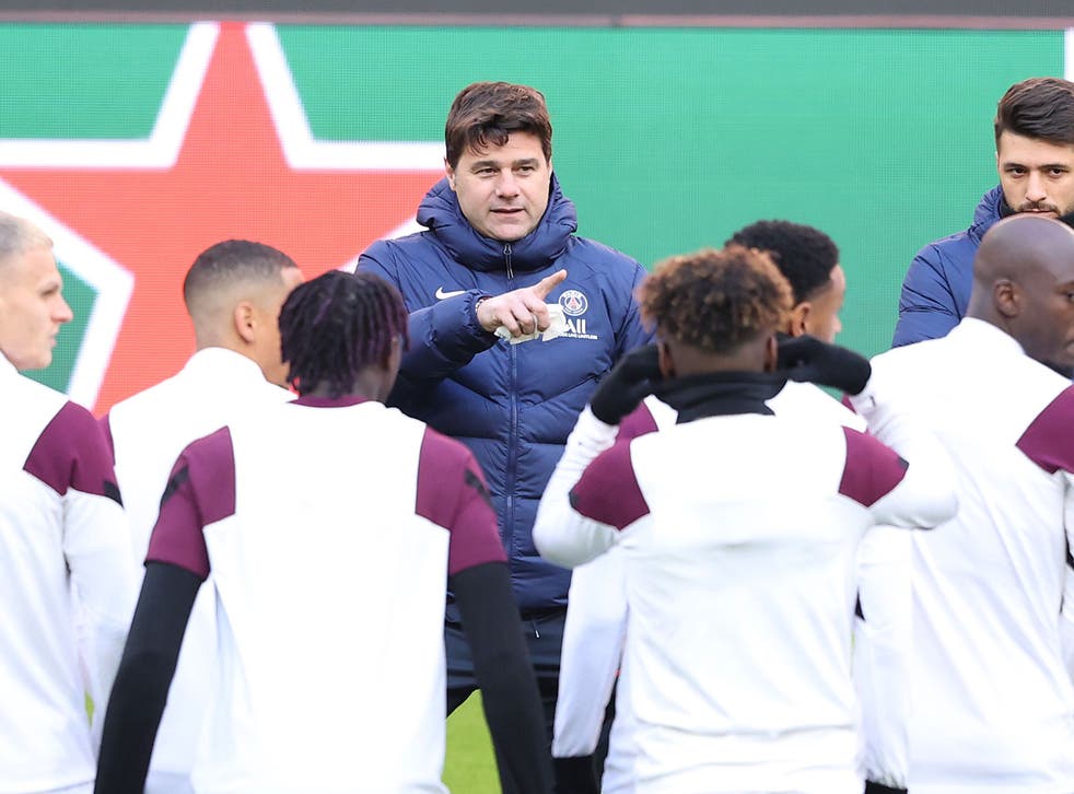 Paris Saint-Germain boss Mauricio Pochettino leads his players in training
