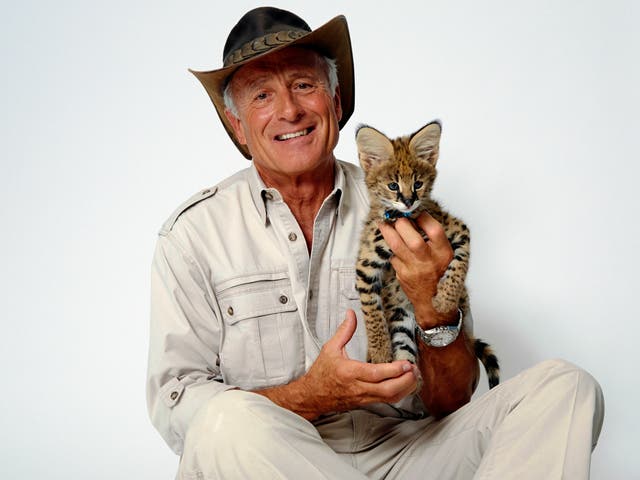 Jack Hanna poses for a portrait with a serval cub on 12 October 2015 in New York