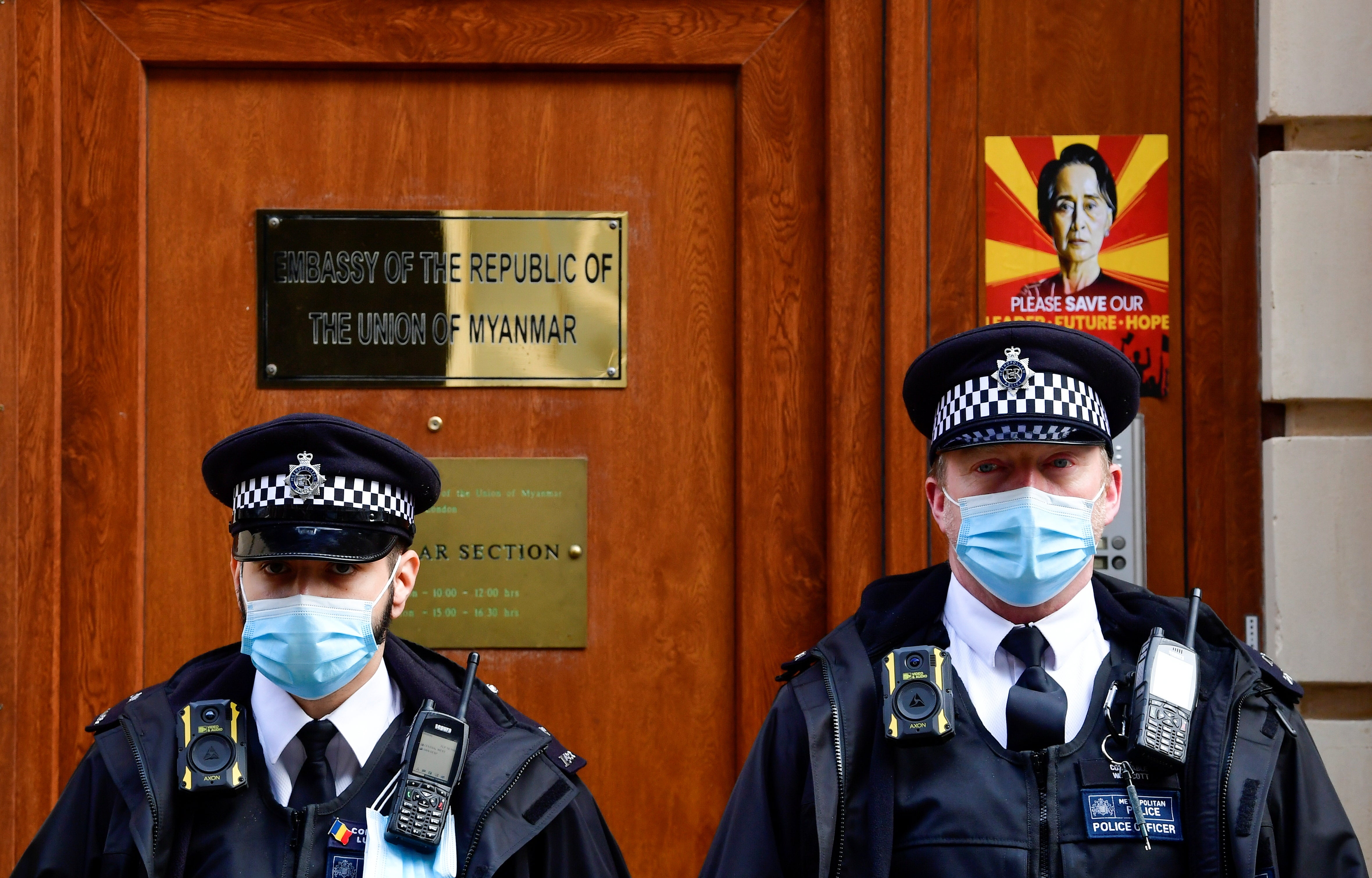 Police officers outside the Myanmar embassy in central London