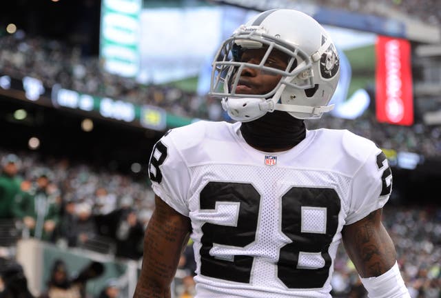 <p>Phillip Adams #28 of the Oakland Raiders looks into the crowd during the first half against the New York Jets at MetLife Stadium on 8 December 2013 in East Rutherford, New Jersey</p>