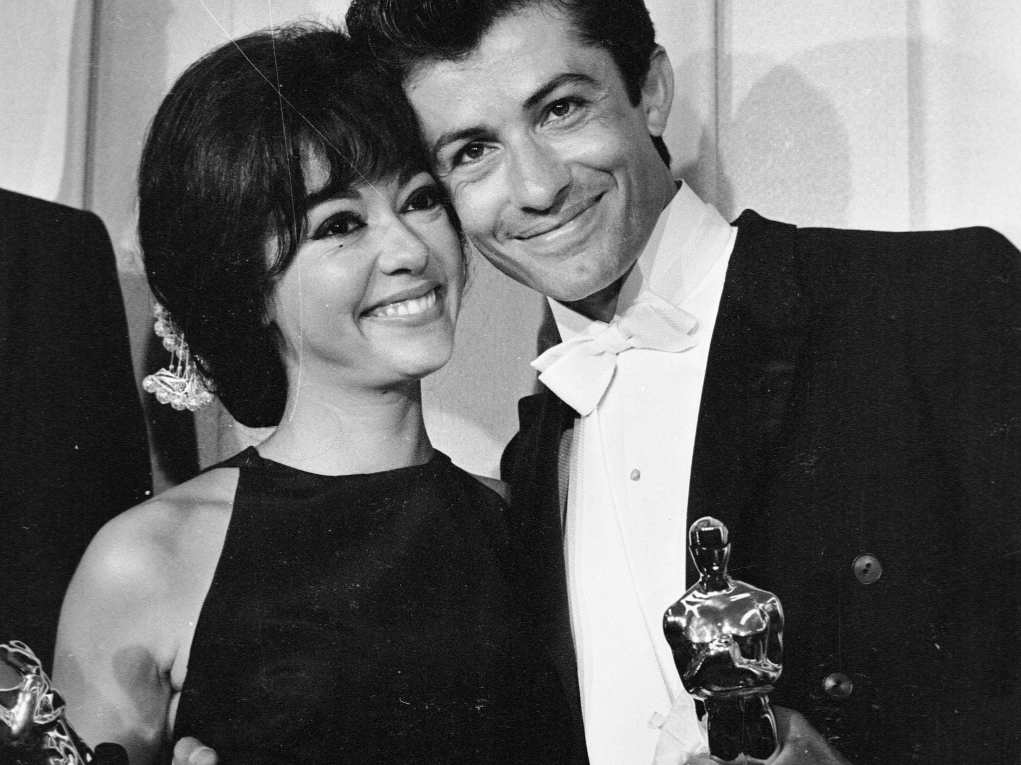 Rita Moreno and George Charkis hold their Oscars