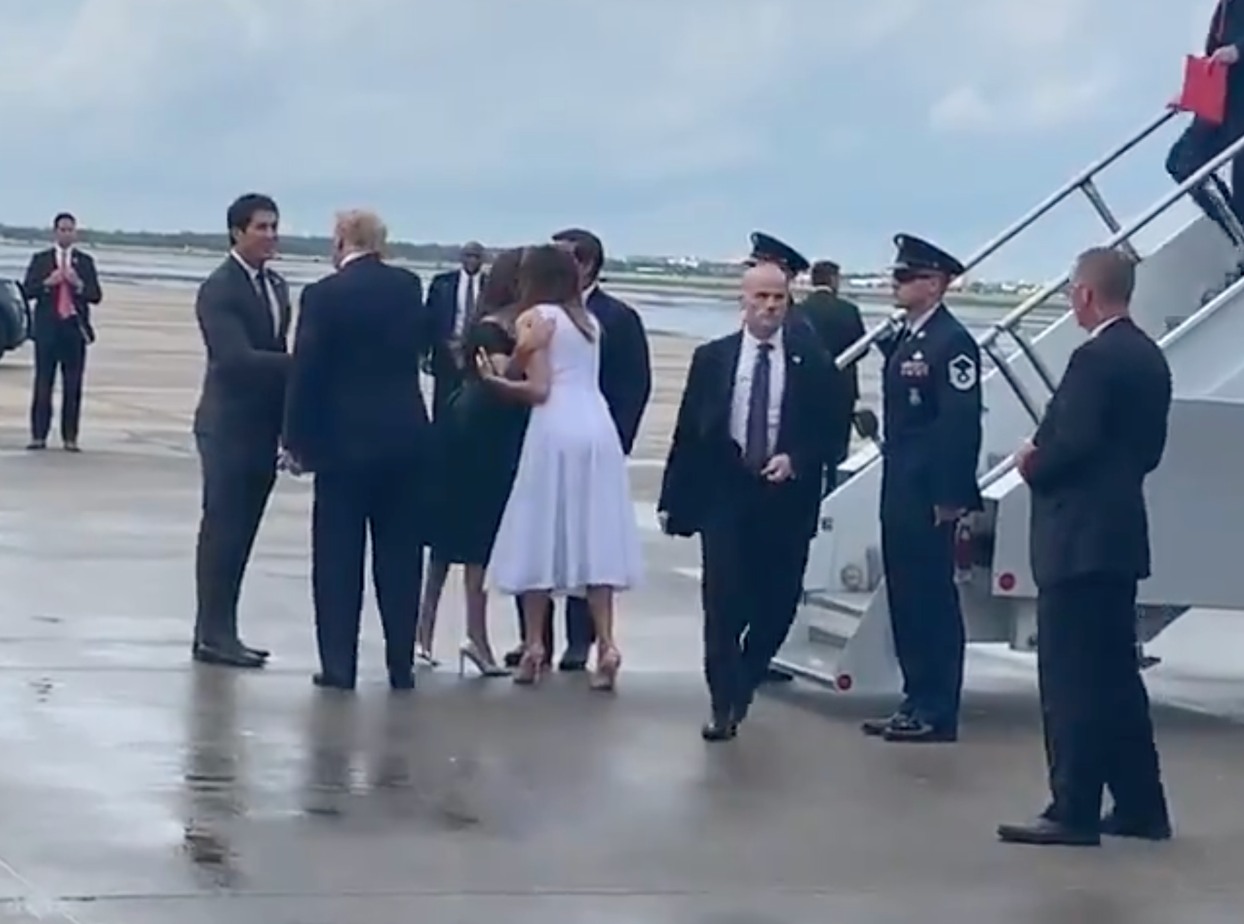 <p>Donald and Melania Trump meet Jason Pirozzolo at an Orlando airport in 2019</p>