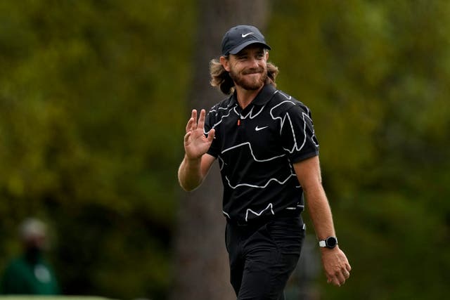Tommy Fleetwood salutes the crowd after clinching a hole in one