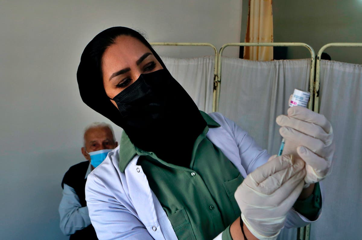 Iraq blames public for new virus record, urges vaccinations