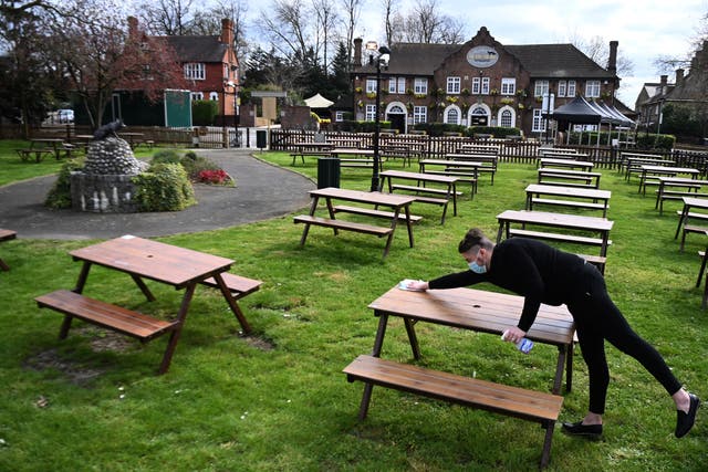 <p>Rainy weather spells bad news for punters hoping to get their <a href="https://www.independent.co.uk/news/uk/politics/lockdown-roadmap-pubs-reopen-weddings-b1805714.html">first pint in a beer garden</a> this year </p>