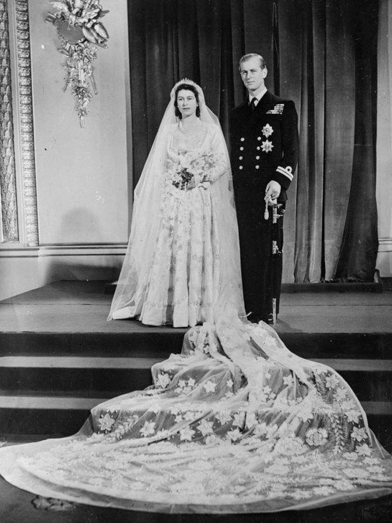 20 November 1947: Princess Elizabeth and the Duke of Edinburgh pose for the press at Buckingham Palace, London, after their wedding ceremony at Westminster Abbey