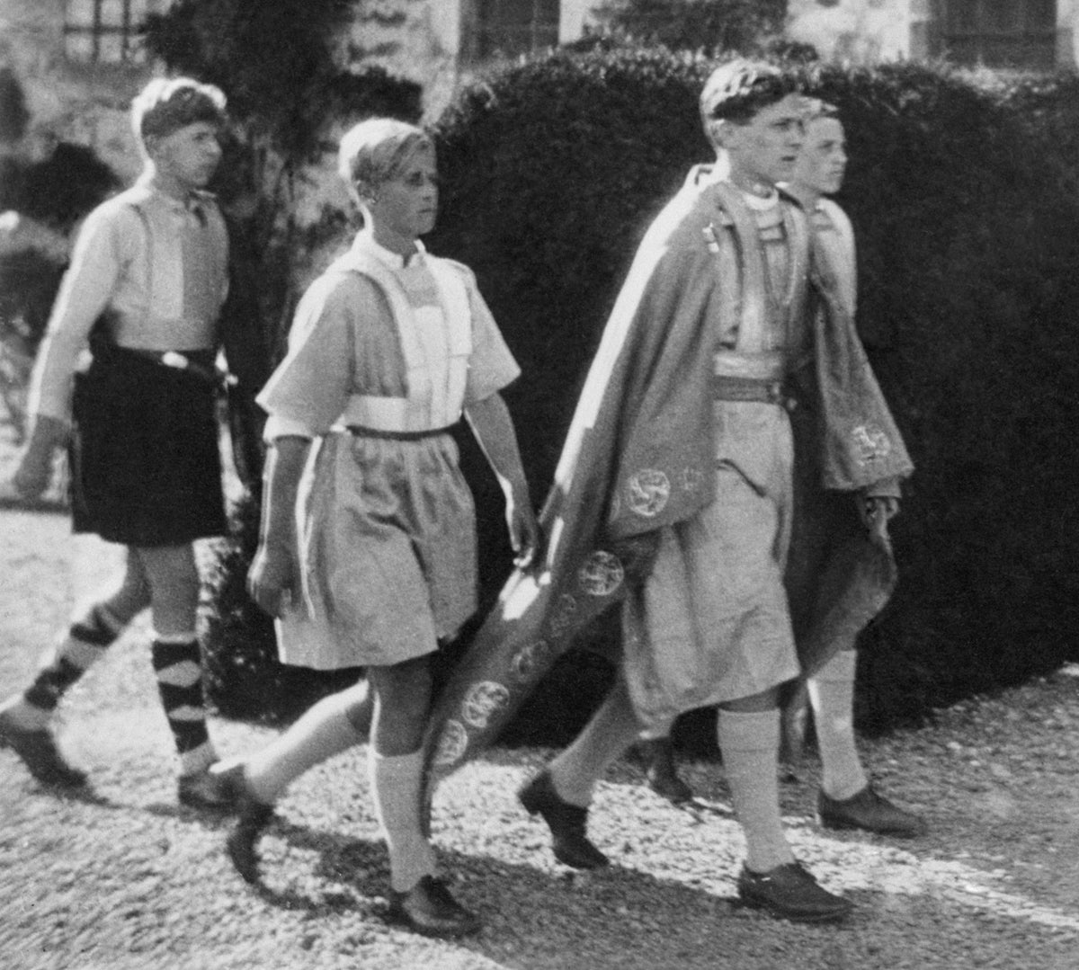 A twelve year old Prince Philip of Greece (2nd from left) takes part in an historical pageant at Gordonstoun School, Moray, Scotland