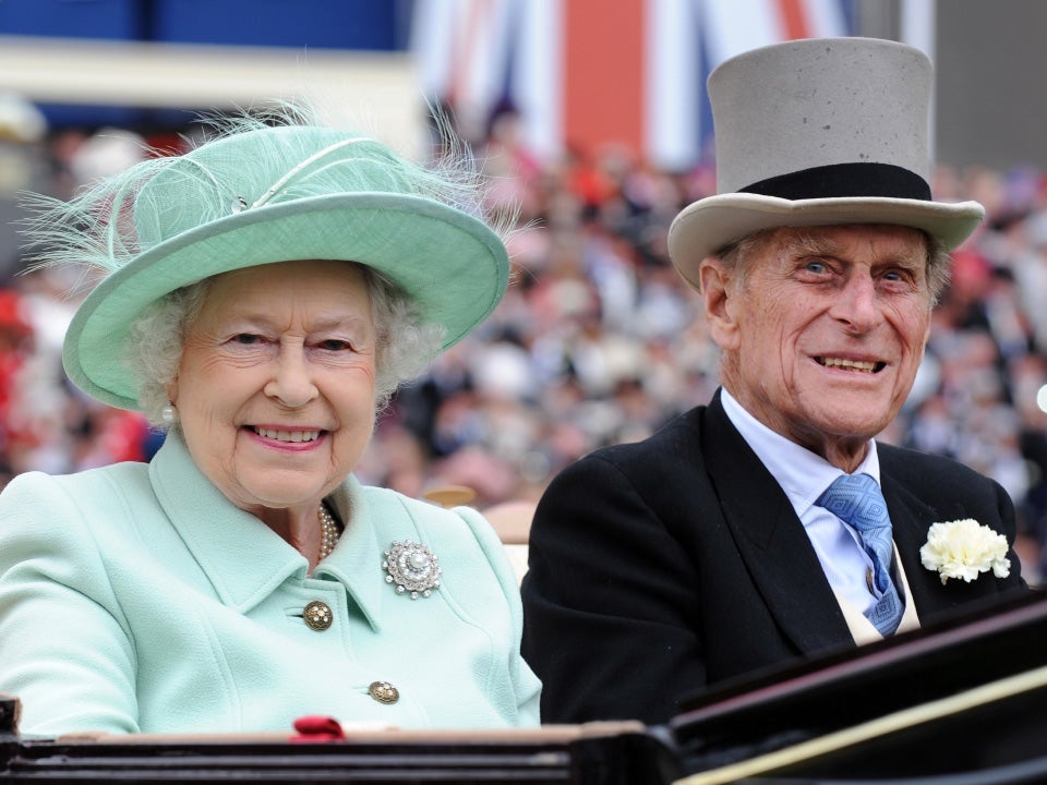 21 June 2012: Queen Elizabeth II (L) and her husband Prince Philip, Duke of Edinburgh arrive to attend Ladies Day at Royal Ascot race meeting, in Ascot, Britain