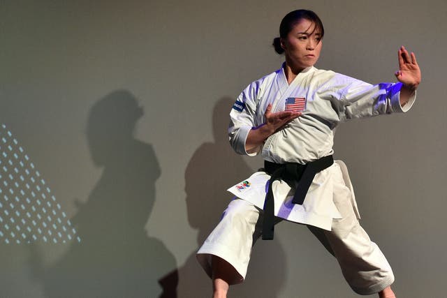 <p>Sakura Kokumai, an American karate champion, says a stranger hurled racial slurs at her in a California park</p>