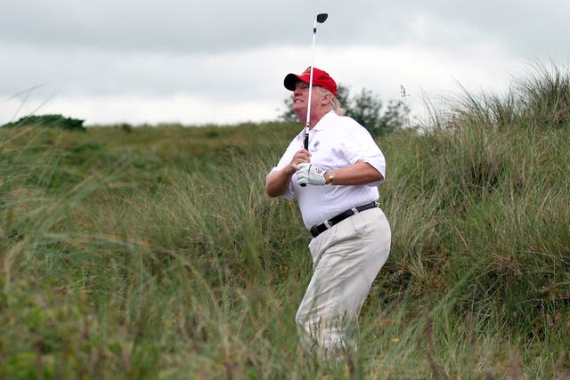 <p>Donald Trump plays a round of golf after the opening of The Trump International Golf Links Course on July 10, 2012 in Balmedie, Scotland. The controversial ?100m course opens to the public on Sunday 15 July</p>
