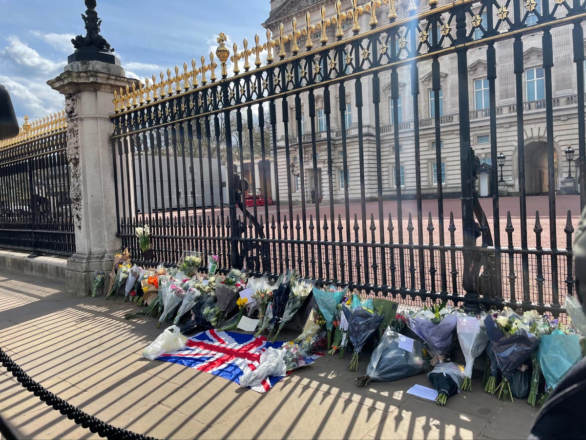 &lsquo;Prince Philip was very beloved&rsquo;: Mourners pay respects to Duke of Edinburgh at Buckingham Palace