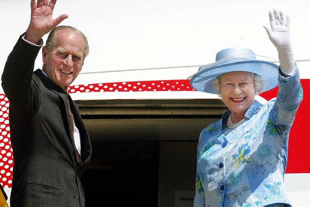 <p>The Queen and the late Prince Philip board a plane in Abuja </p>