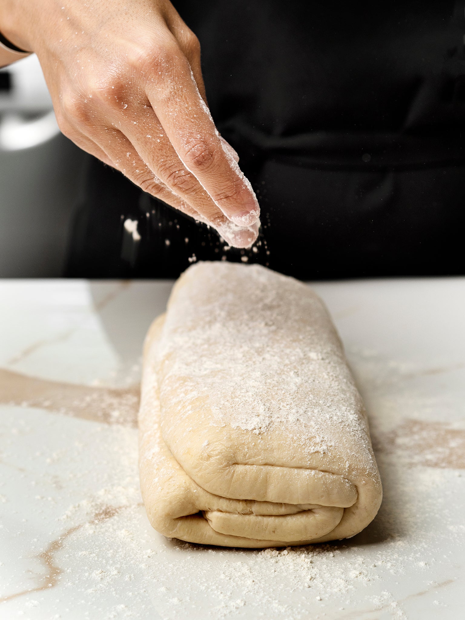 Flour added to dough for bread