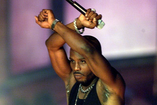 <p>A man who knew he was a work in progress: DMX performs at The Source Awards in 2001</p>