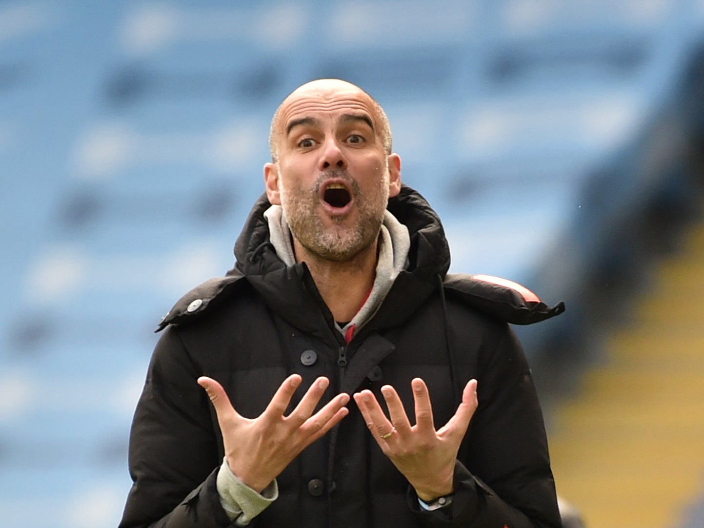 Manchester City coach Pep Guardiola reacts during his team’s loss to Leeds
