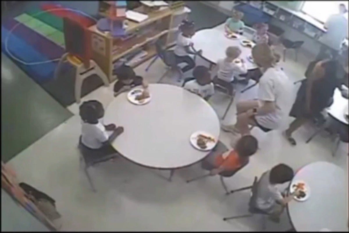 A screenshot of a live-stream video of Kids ‘R’ Kids, a daycare franchise in Roswell, Georgia, which reportedly shows white children being fed whilst black children wait
