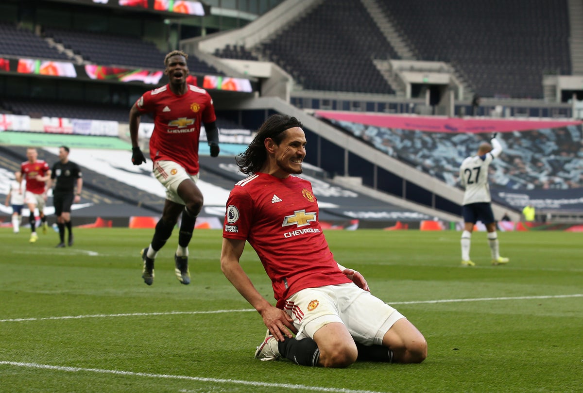 Manchester United's Edinson Cavani (left) fouls Tottenham Hotspurs