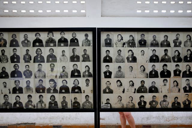 Pictures of victims of the Khmer Rouge regime at the former Tuol Sleng prison that is now a museum on the Cambodian genocide