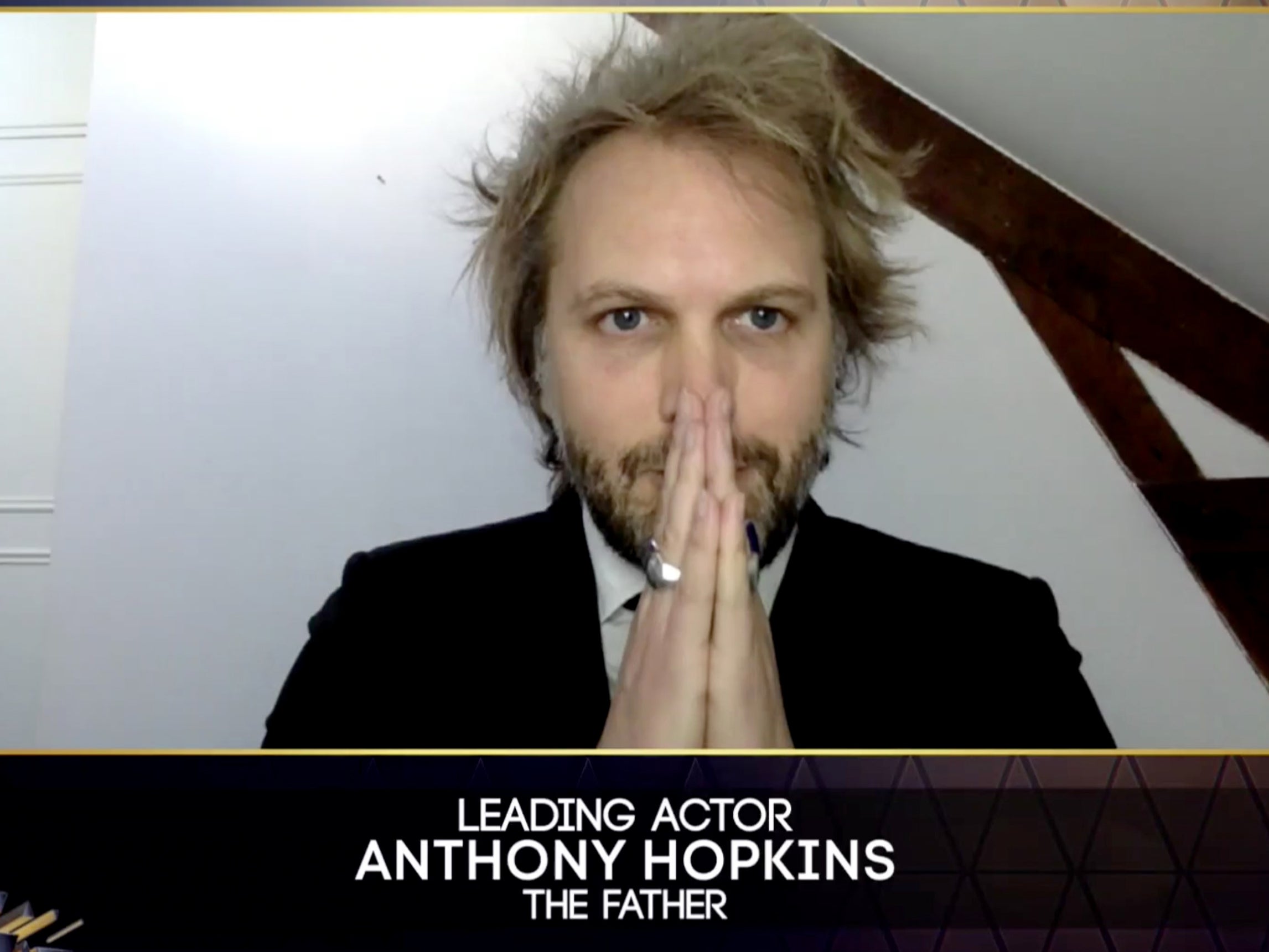 Florian Zeller accepting the Leading Actor award on Sir Anthony Hopkins’s behalf