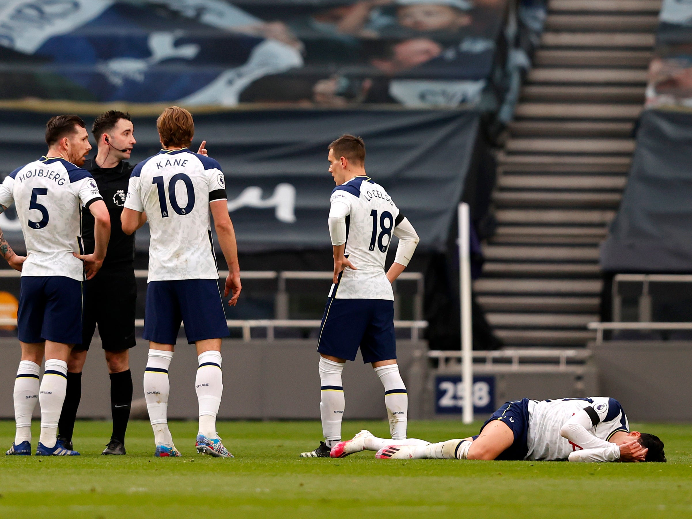 Son Heung-min (right) on the turf in Tottenham’s loss to Manchester United