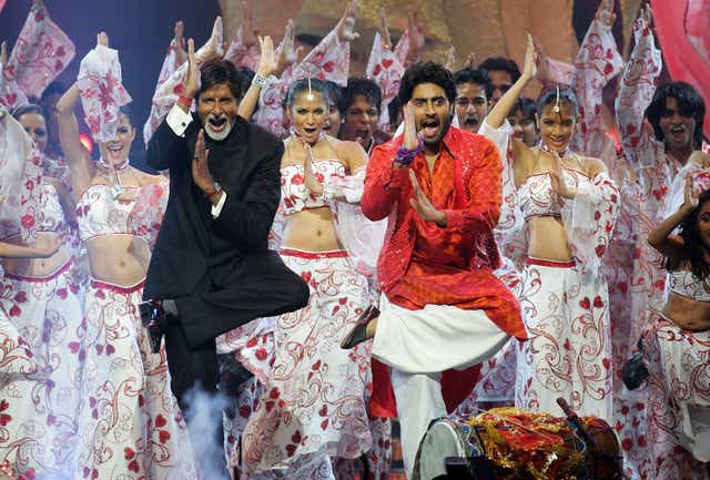 <p>File image: Bollywood actors Amitabh Bachchan and his son Abhishek Bachchan perform on stage at the International Indian Film Academy Awards </p>