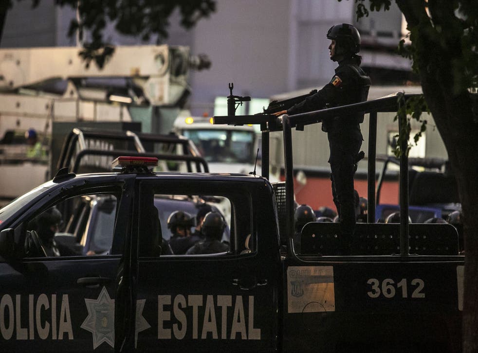 File image of Mexican police on patrol. National agencies said law enforcement had been called in to search for the missing truck