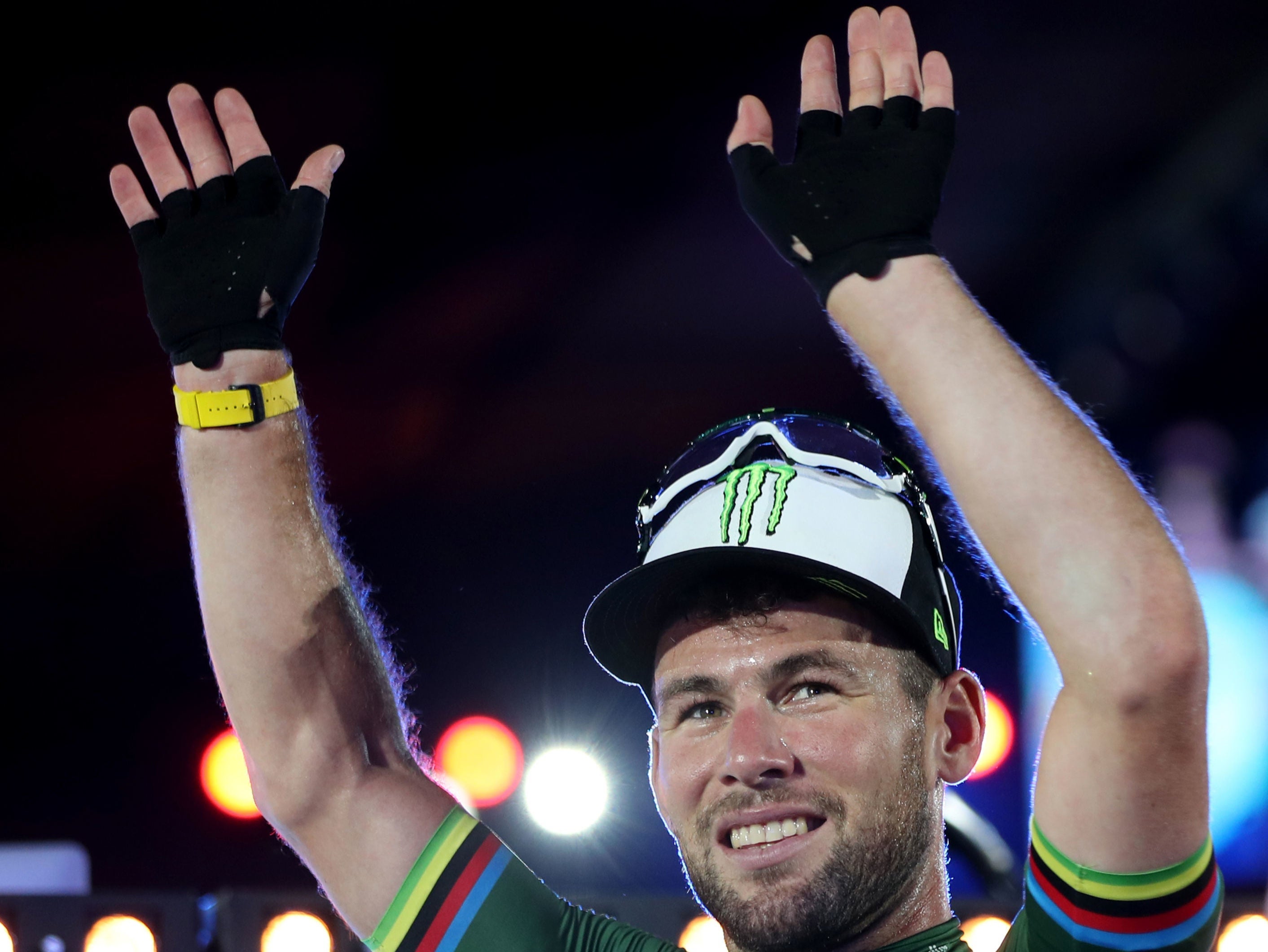 Mark Cavendish celebrates winning in a sprint finish