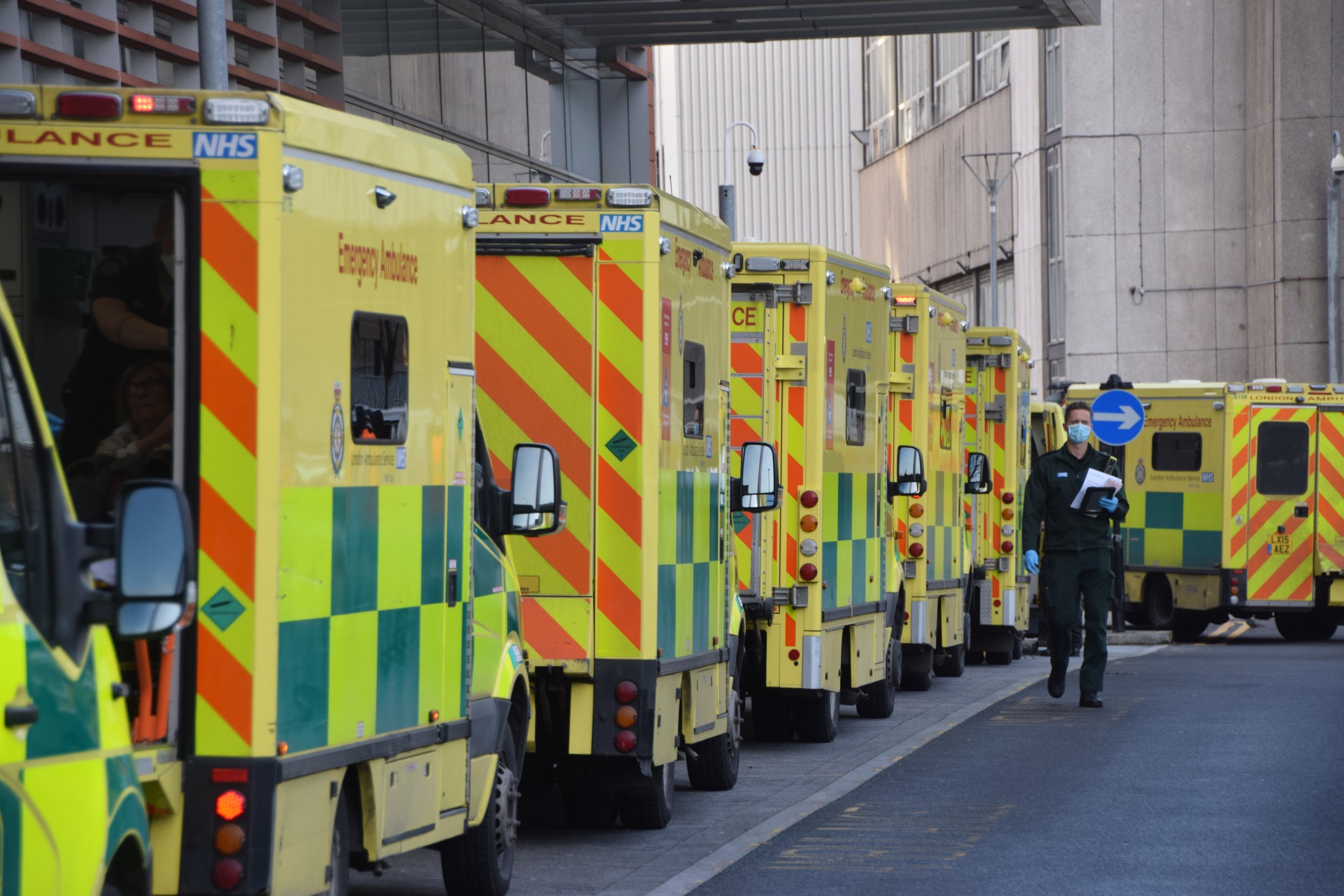 Ambulances queue outside the Royal London Hospital in London in January