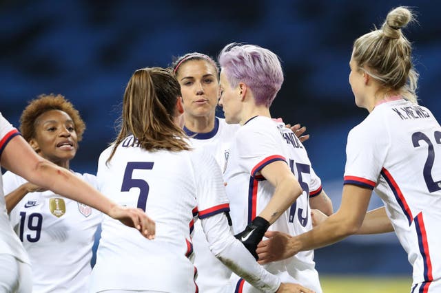 <p>Megan Rapinoe celebrates with teammates after scoring against Sweden</p>