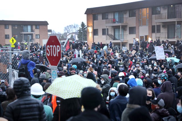Demonstrators face off with police outside of the Brooklyn Center police station on April 12, 2021 in Brooklyn Center, Minnesota. 
