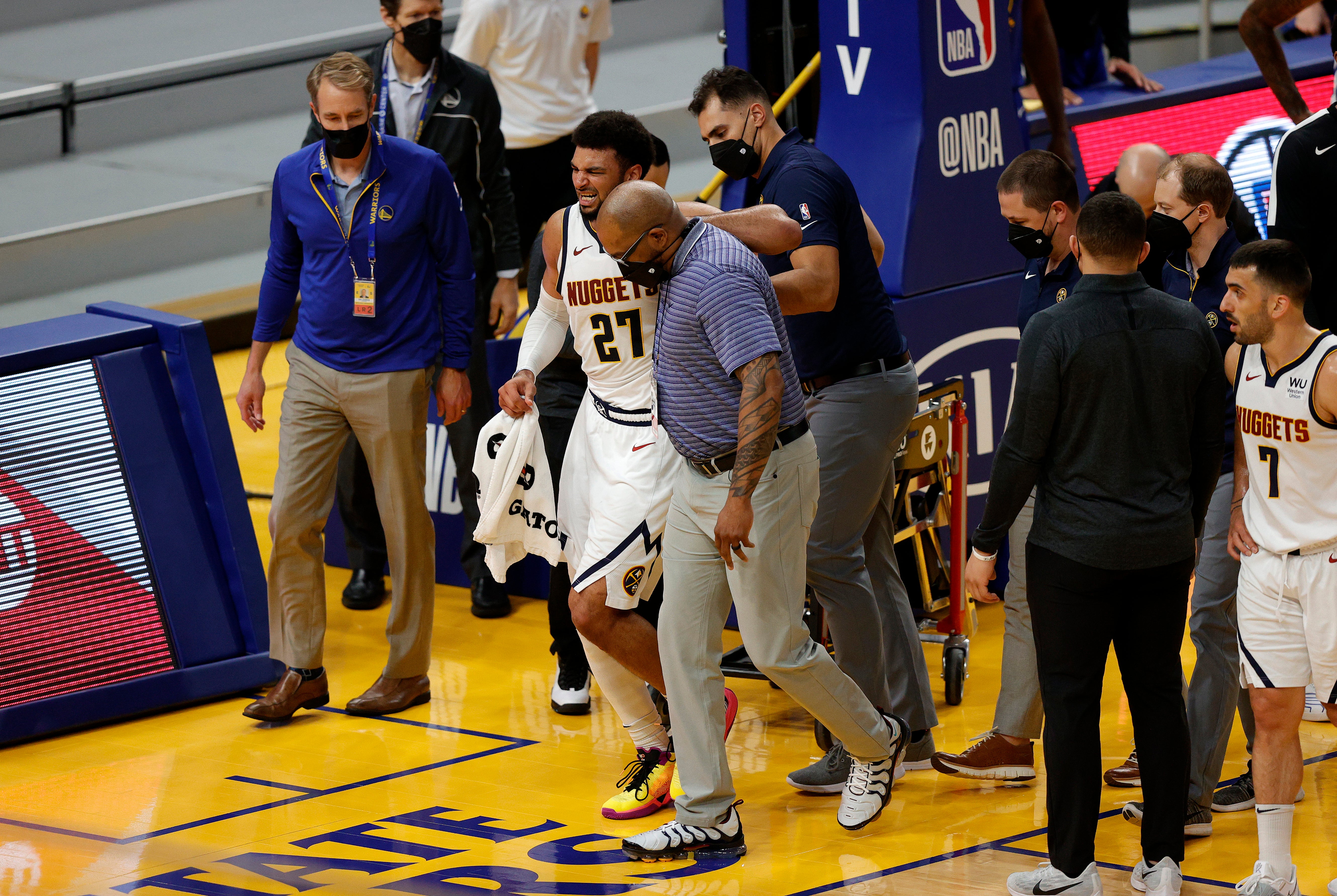 Jamal Murray walked off the court following the injury