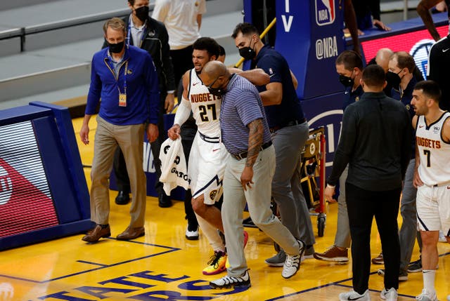 <p>Jamal Murray walked off the court following the injury</p>