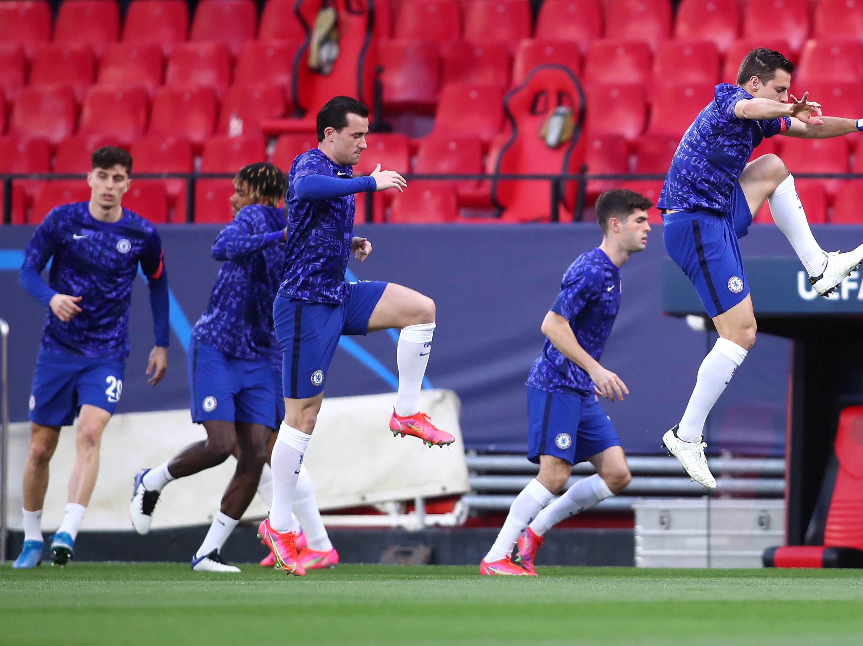 Chelsea players warming up as they await kick-off with Porto