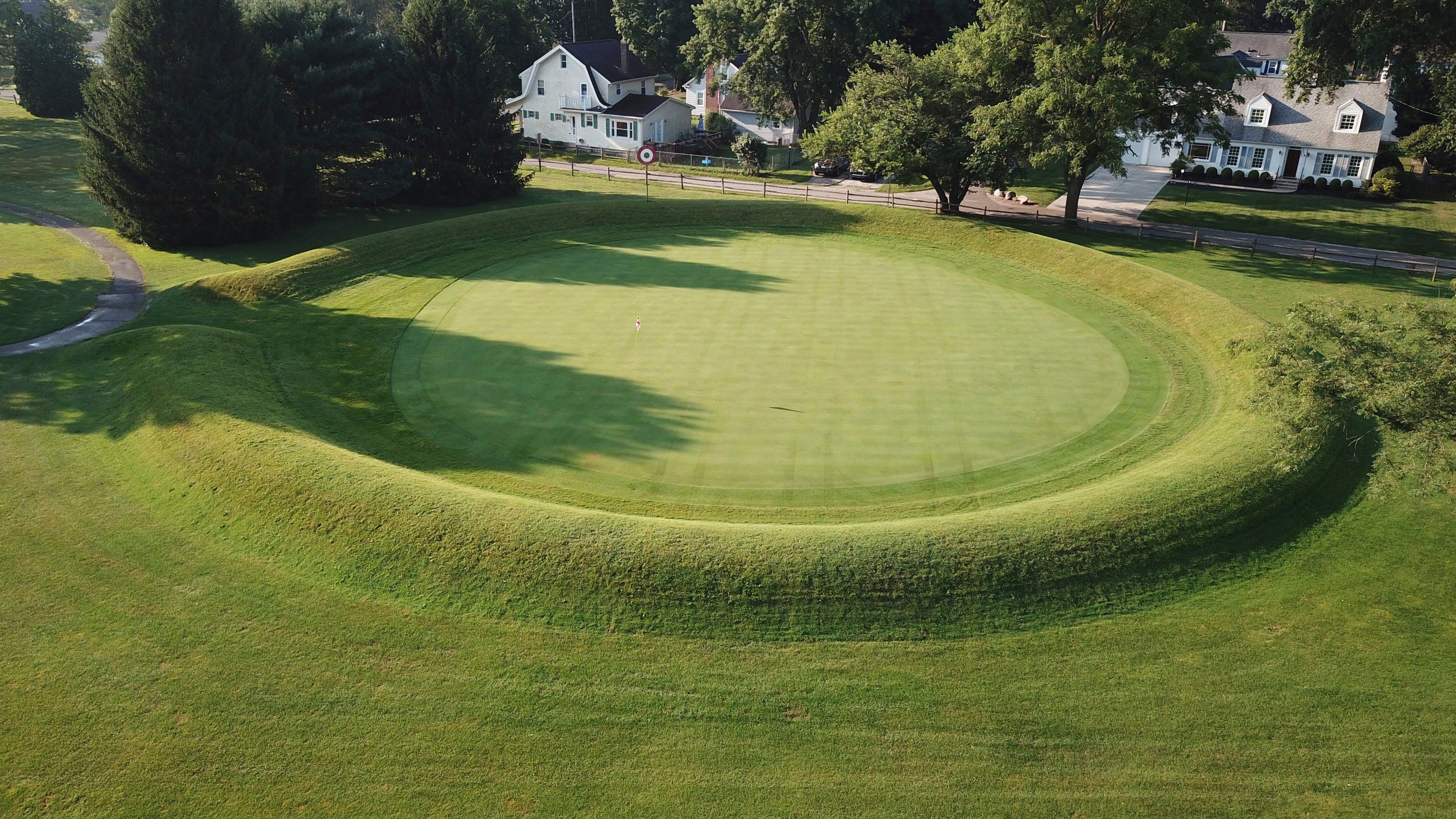 This photo made on July 30, 2019 shows a 155 ft. diameter circular enclosure around hole number 3 at Moundbuilders Country Club at the Octagon Earthworks in Newark, Ohio.