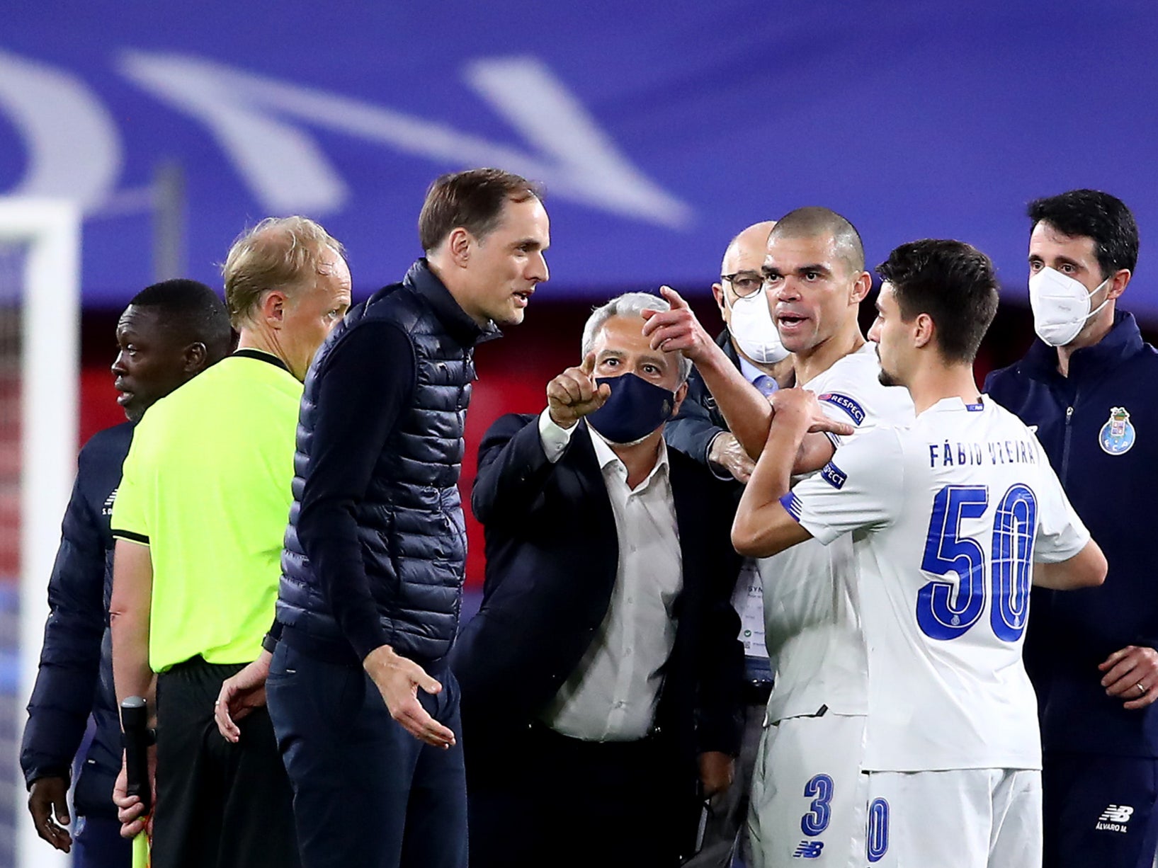 Thomas Tuchel (centre left) at full-time in Seville, where Chelsea defeated Porto over two legs