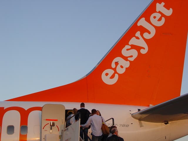 Departing soon? Passengers boarding an easyJet plane