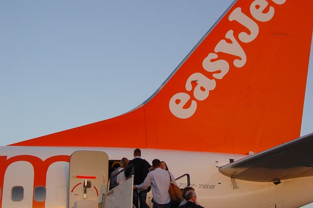 Departing soon? Passengers boarding an easyJet plane