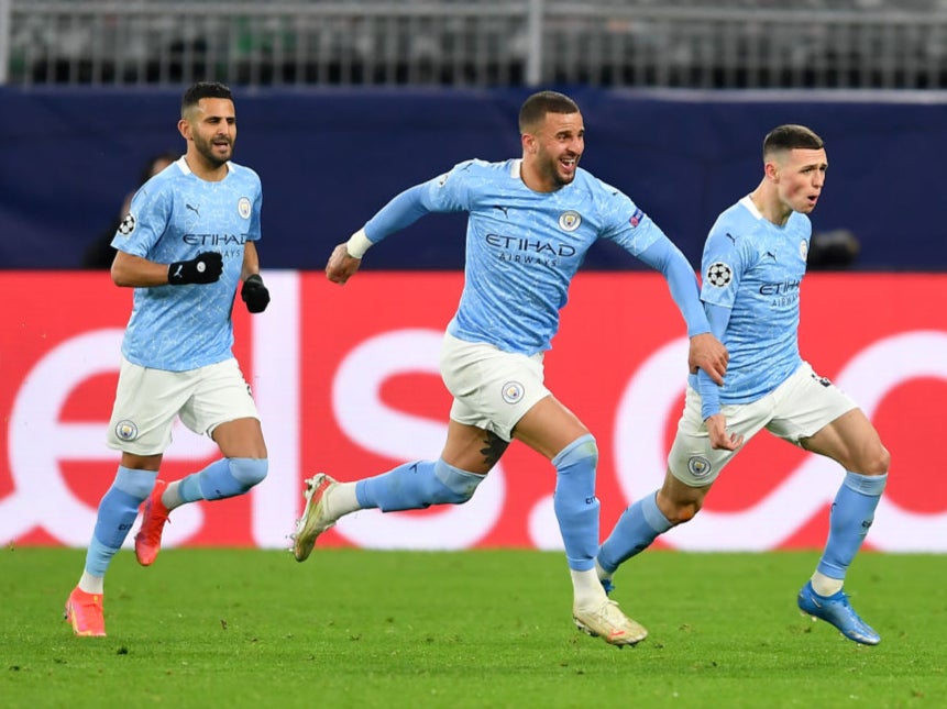 Riyad Mahrez, Kyle Walker and Phil Foden celebrate