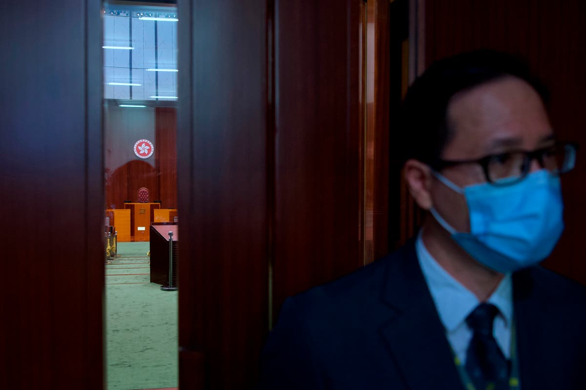 Beijing official in Hong Kong warns against foreign meddling