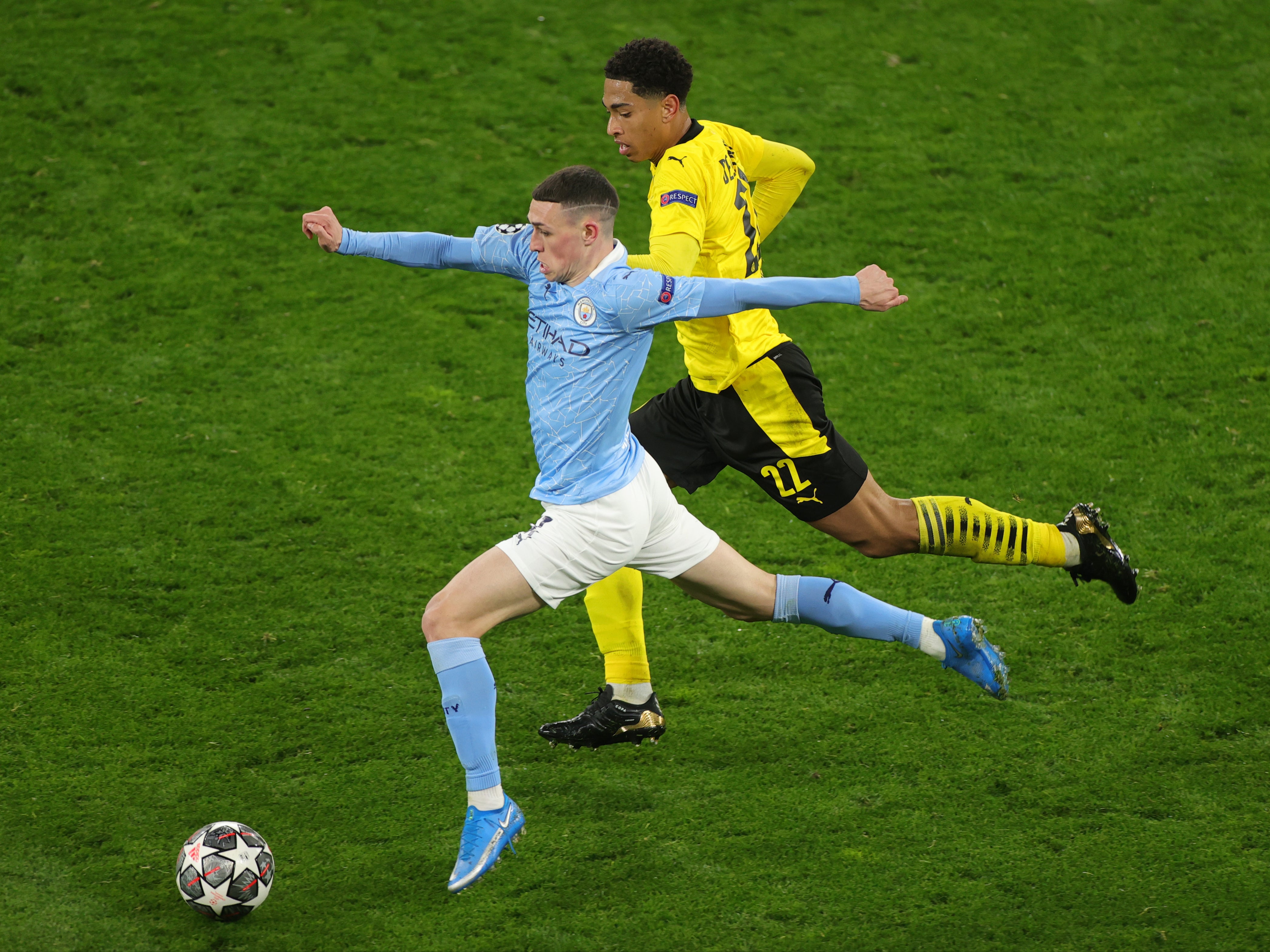 Phil Foden of Manchester City and Jude Bellingham of Borussia Dortmund