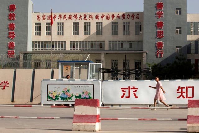 A photo from 2018 showing the Kashgar Dongcheng No. 4 Junior Middle School, which is part of a cluster of schools with slogans which read, ‘Study hard to realise the Chinese dream of the great rejuvenation of the Chinese nation,’ ‘Kind Learning, Kind Thoughts, Kind Actions,’ and ‘Pursue Knowledge,’ on the outskirts of in Kashgar, western China’s Xinjiang region