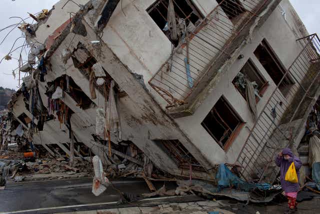<p>A destroyed building, moved by the tsunami in  Japan’s Miyagi prefecture in 2011</p>