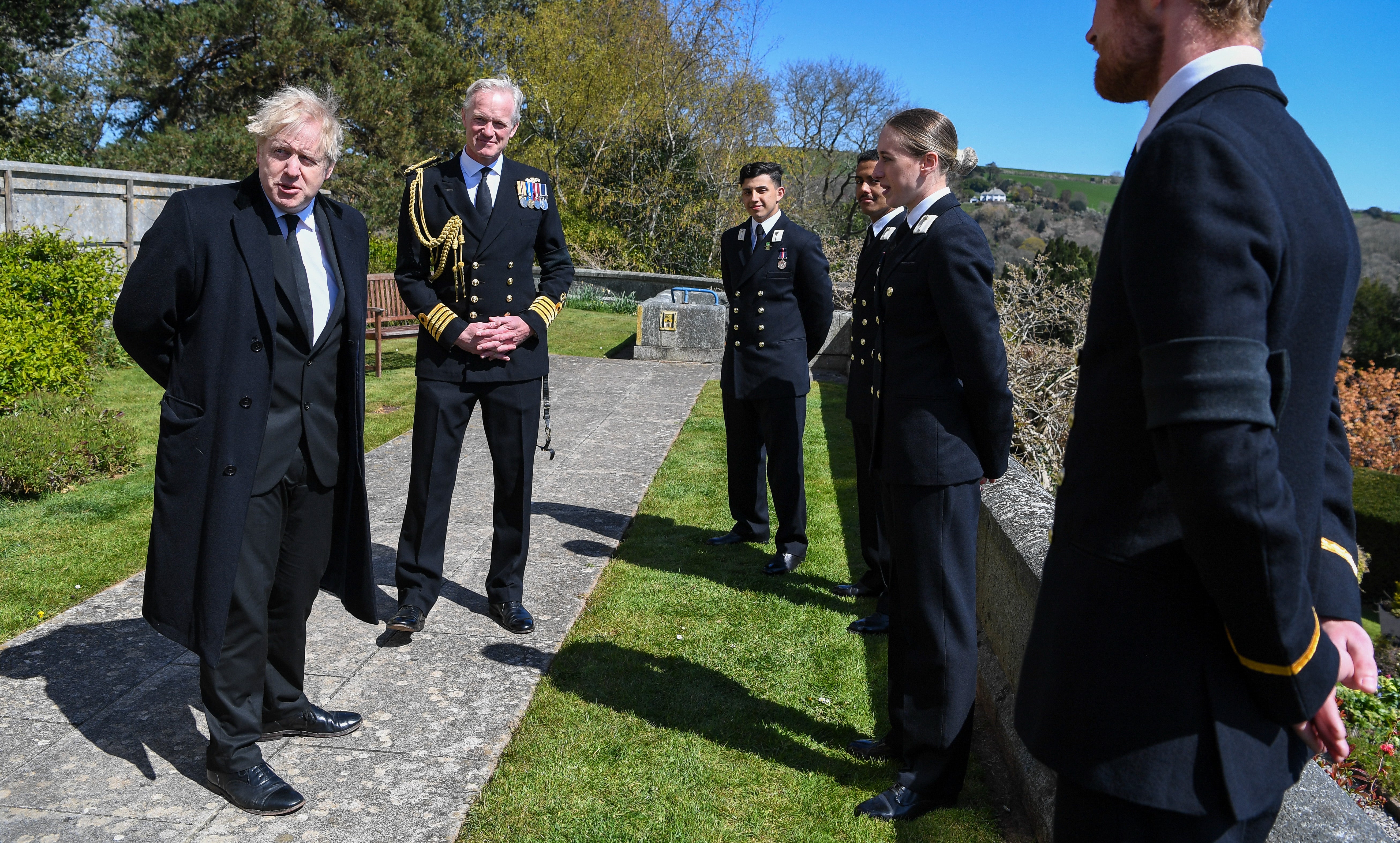 Prime Minister Boris Johnson meets cadets with Captain Roger Readwin after the Passing-out parade at Britannia Royal Naval College during his visit in commemoration of HRH The Prince Philip