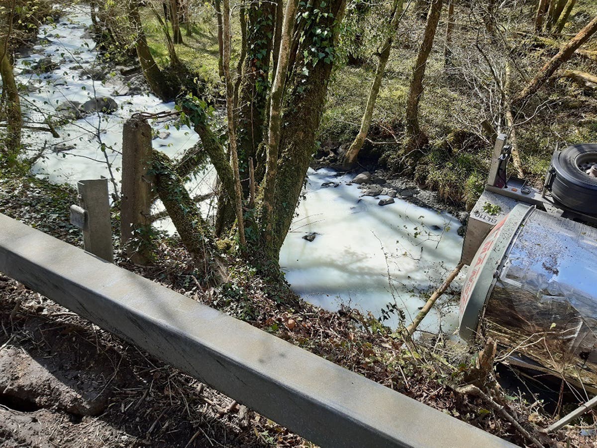 River turns white after milk truck overturns